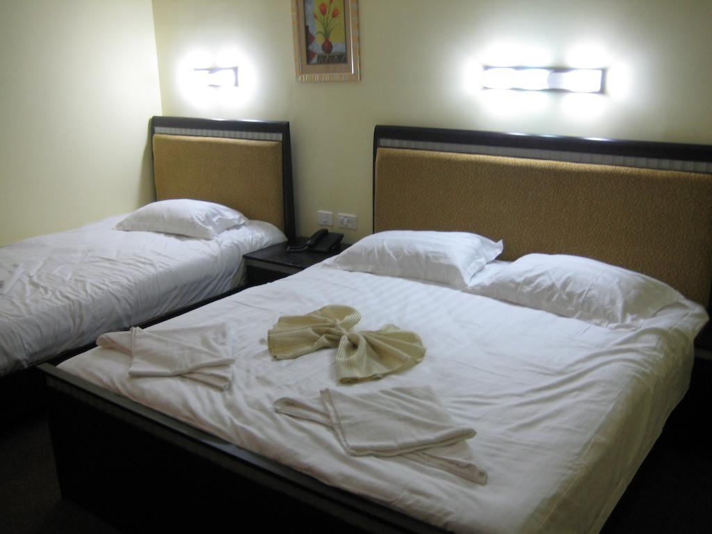 Holy Family Hotel Belém Quarto foto